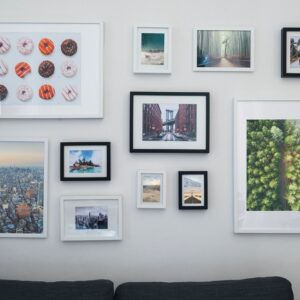 Home interior with sofa and paintings on the wall