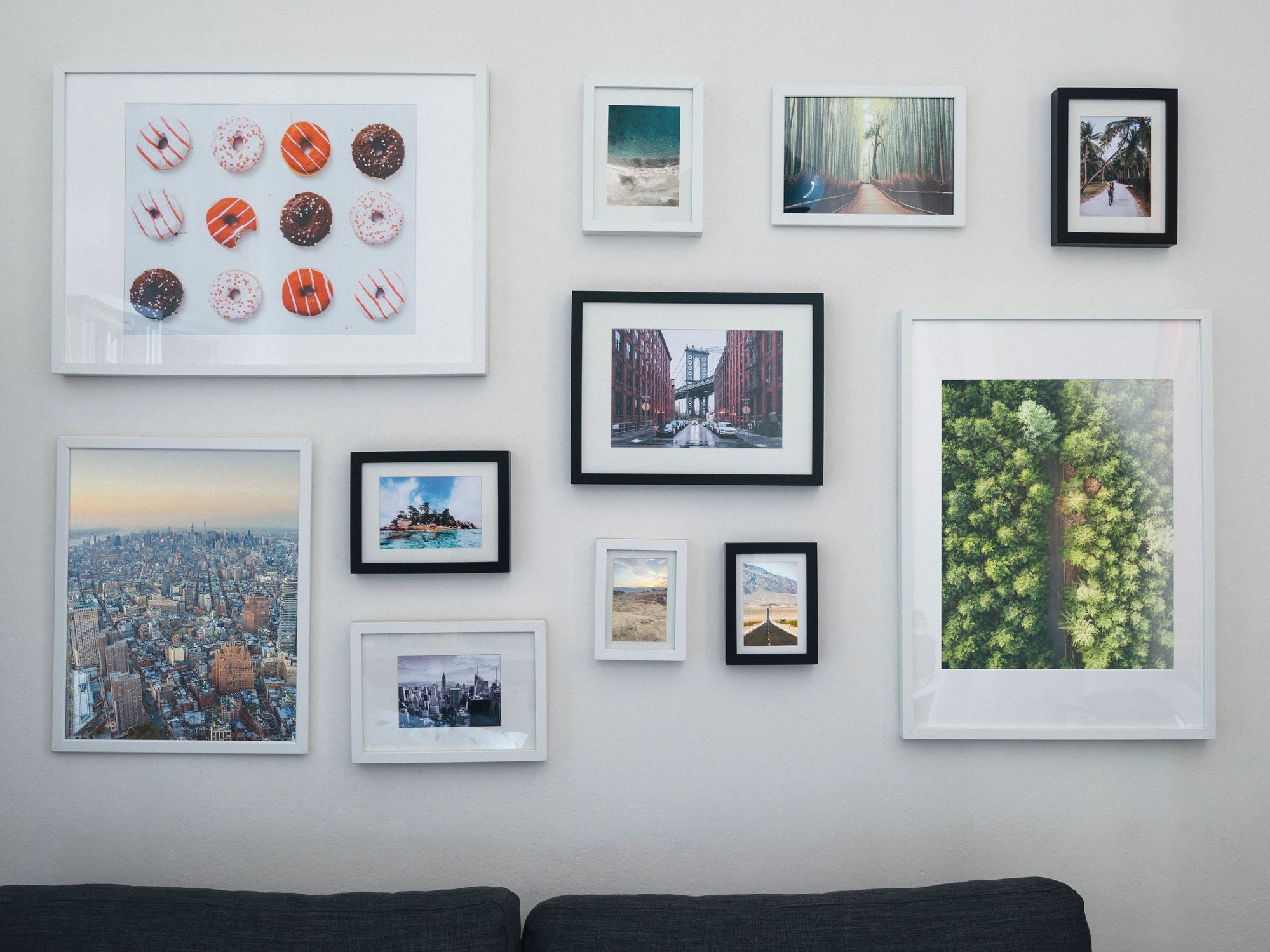 Home interior with sofa and paintings on the wall